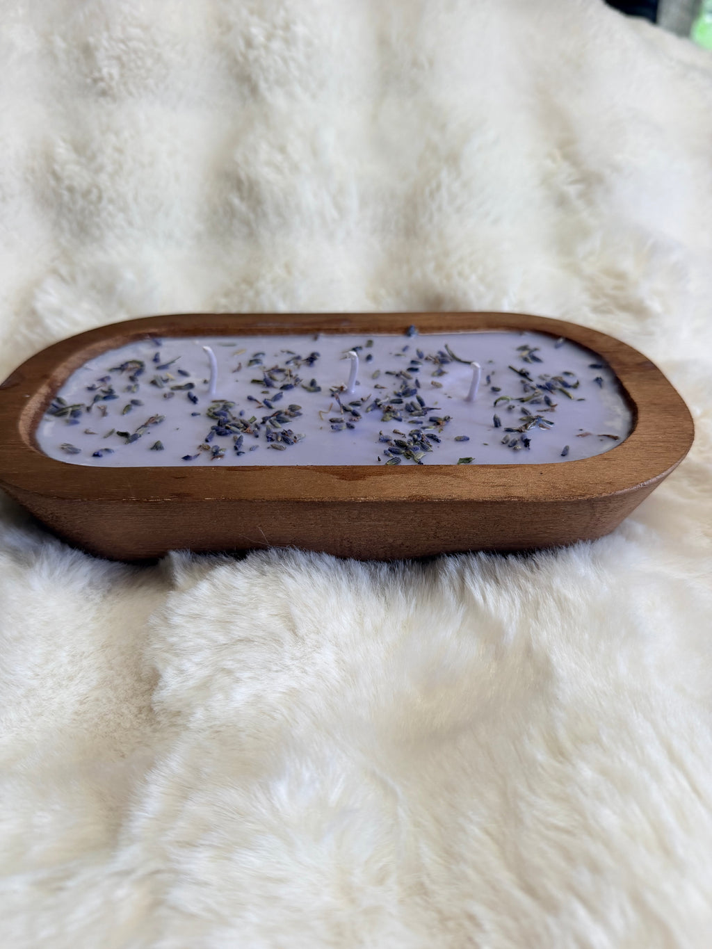 Lavender and vanilla scented soy candle with dried lavender