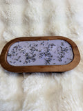 Lavender and vanilla scented soy candle with dried lavender