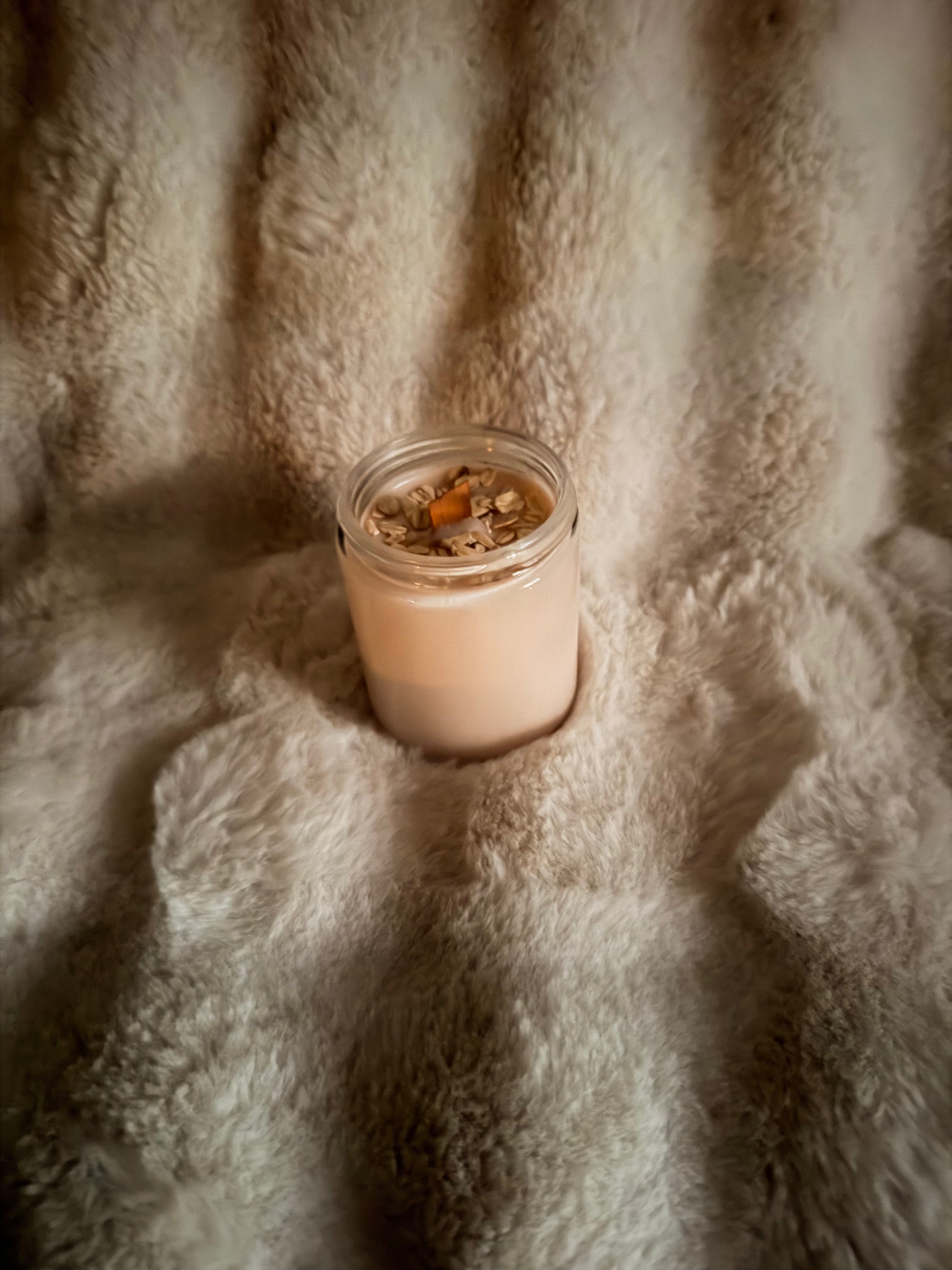 Oats and honey wood wick soy candle in a jar